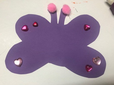 Recycled Coffee Lid Animals - jewels and pom poms glued on