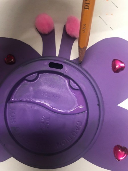 Recycled Coffee Lid Animals - trace around the painted lids