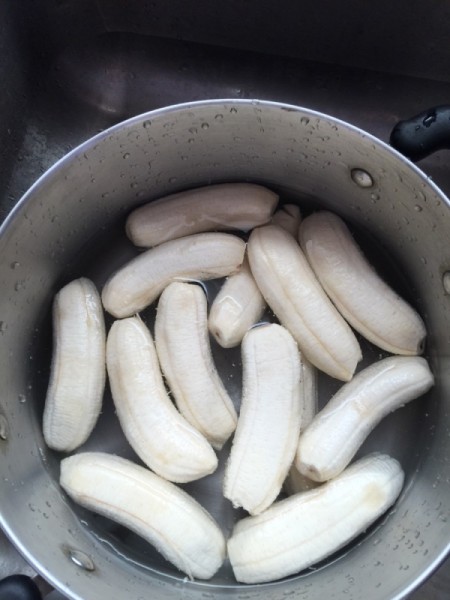 bananas in pan with salt water