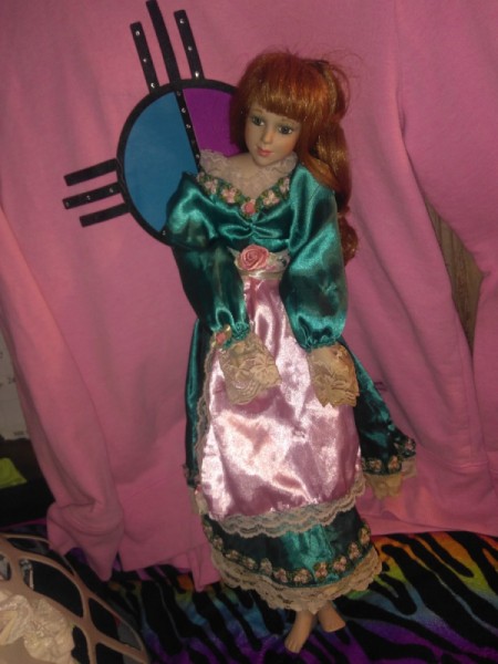 Identifying a Porcelain Doll - red headed doll with pink and green dress