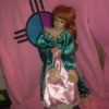 Identifying a Porcelain Doll - red headed doll with pink and green dress