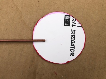 Skewer and Bottle Cap Starburst Art - attach the skewers to back with hot glue