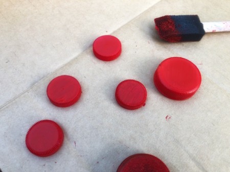 Skewer and Bottle Cap Starburst Art - paint the bottle caps and allow to dry