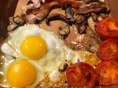 Eggs added to pan