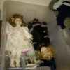 Value of Old Dolls - two dolls in a plastic storage box