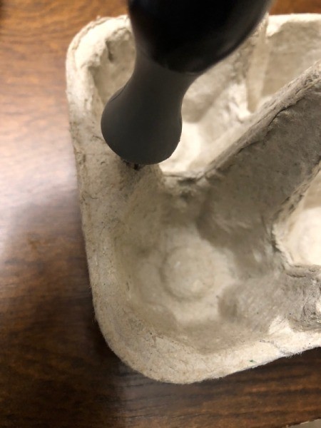 Egg Carton Sail Boat - cutting the hole at the carton end