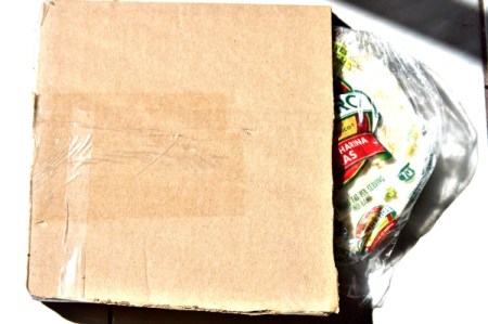 A cardboard package to store tortillas in the freezer.