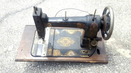 Finding Information on a Square Deal Sewing Machine - machine out of the cabinet