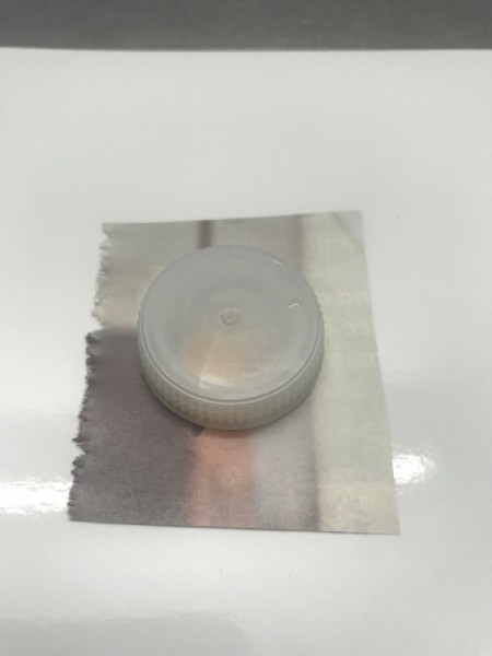 Matching Game Made with Water Bottle Caps - place cap on page