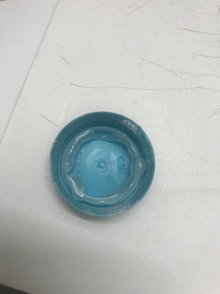 Matching Game Made with Water Bottle Caps - apply glue