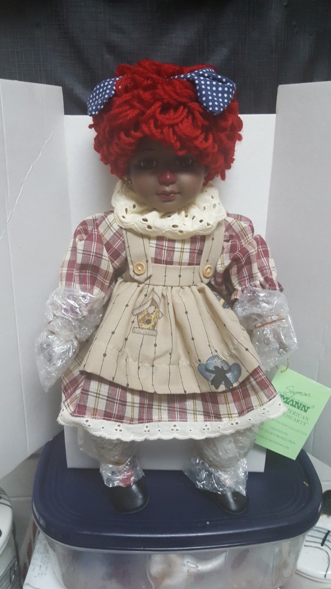 raggedy ann and andy porcelain dolls worth