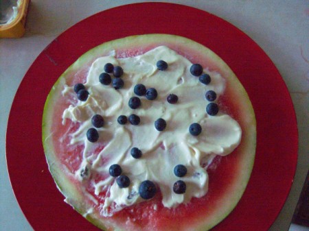 Watermelon with yogurt and blueberries