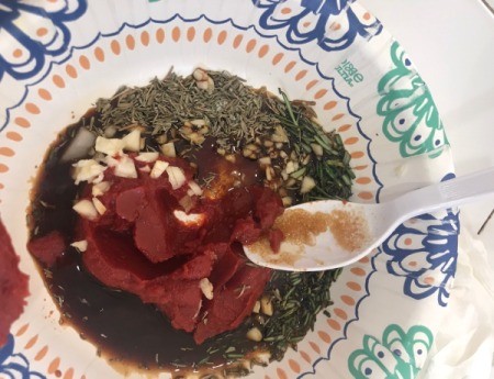 mixing seasonings in bowl