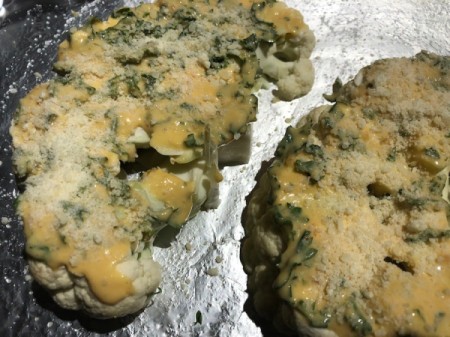 Cauliflower with sauce and more parmesean