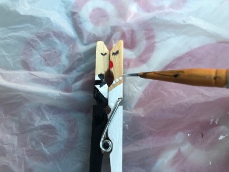 Bride and Groom Clothespin Decor - draw on a black bow tie on the groom and white pearls for the bride