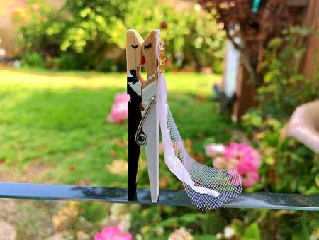Bride and Groom Clothespin Decor - ready for the big kiss