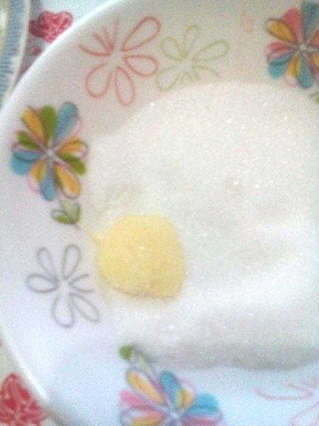 rolling dough in sugar