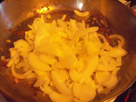 onions cooking in pan