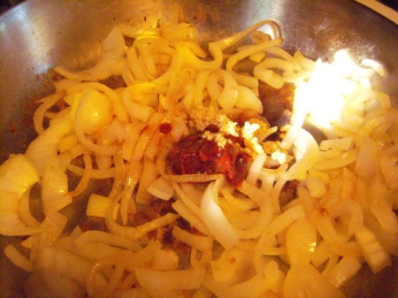 onions with added tomato paste and seasoning