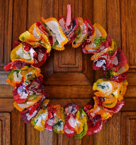 Color Explosion Summer Wreath - finished paper liner wreath hanging on a door