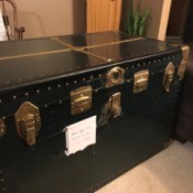 Determining the Age and Origin of an Antique Trunk - blue trunk with brass fittings