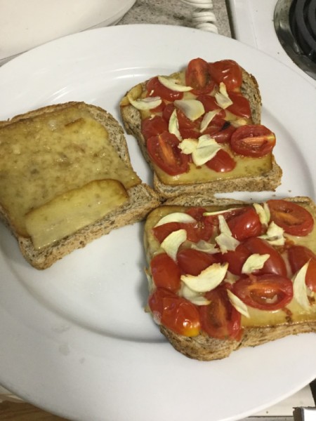 cheese tomato, and garlic added to Sandwiches