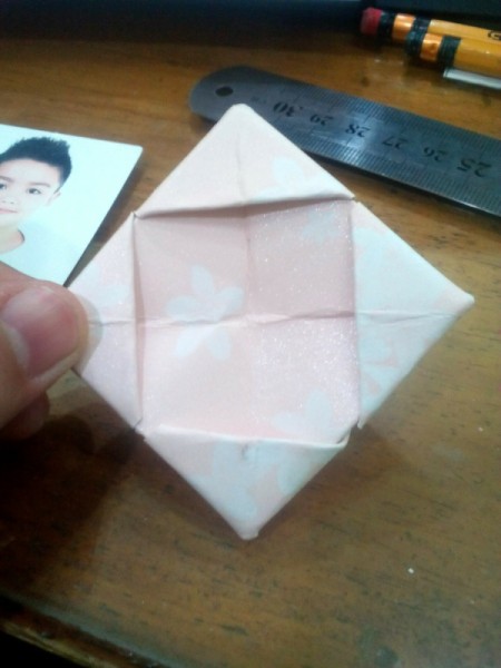 Folded Paper Photo Frame - repeat in all four corners, forming a square frame