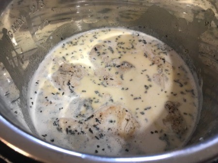 cooked chicken added to pot