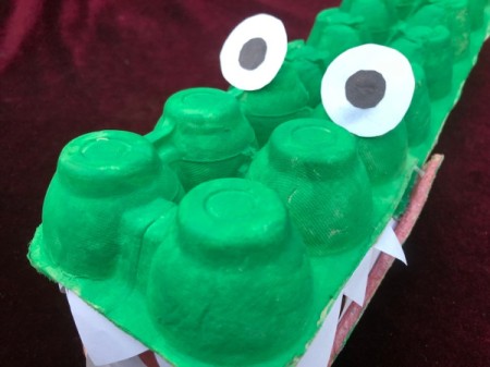 Egg Carton Alligator - glue eyes to the third cup set on the top of the mouth