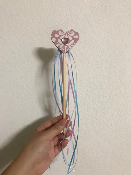 Ribbon Wand - hand holding the finished wand