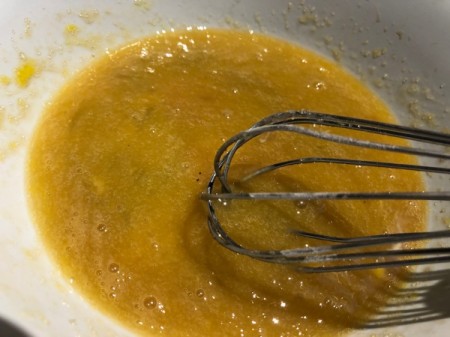 mixing sugar, egg and vanilla