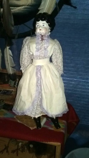 Value of a Porcelain Doll - antique looking doll in long white dress