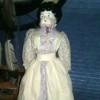 Value of a Porcelain Doll - antique looking doll in long white dress