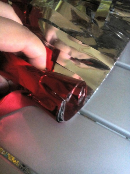 DIY Cheering Pom Poms - carefully roll them up