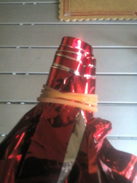 DIY Cheering Pom Poms - rubber band the end or handle