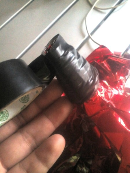 DIY Cheering Pom Poms - wrap with colored electrical tape