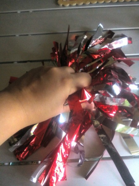 DIY Cheering Pom Poms - crumple the strips to add volume