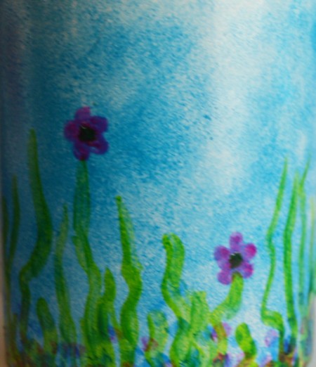 Mug Turned Colorful Candle Holder - mix the emerald and blue glaze to make a darker green and add shadows to the grass shoots and to color the center of the flowers