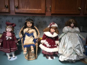 Identifying Porcelain Dolls - 4 dolls on stands