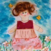 Flower Girl Kid Collage Activity - finished artwork with butterflies glued in place