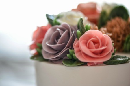 Decorated cake with icing roses.