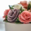 Decorated cake with icing roses.