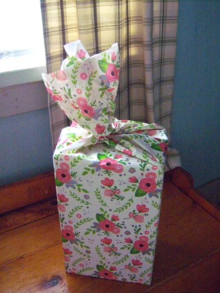 Flower Gift Wrapping - tape bottom and sides and then gently twist top clockwise