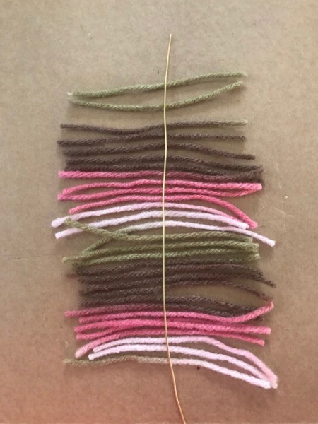 Recycled Cardboard Ring and Yarn Dreamcatcher - tie the yarn to the wire