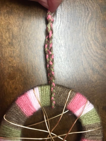 Recycled Cardboard Ring and Yarn Dreamcatcher - loop braided yarn through the ring and knot to create a hanger