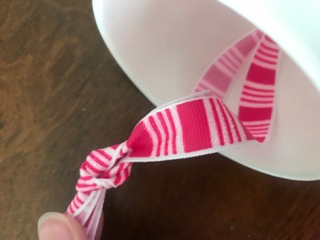 Jellyfish Piñata for Kids - tie a knot in the ends