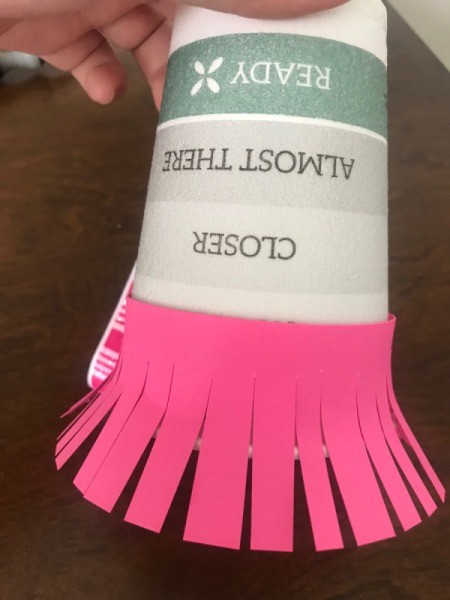 Jellyfish Piñata for Kids - hot glue paper strips to the cup