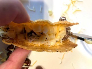 hand held filled Taco