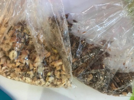 chopped nuts and chocolate in plastic bags