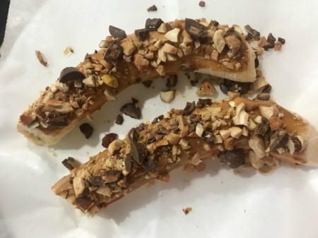 nuts amd chocolate on banana
